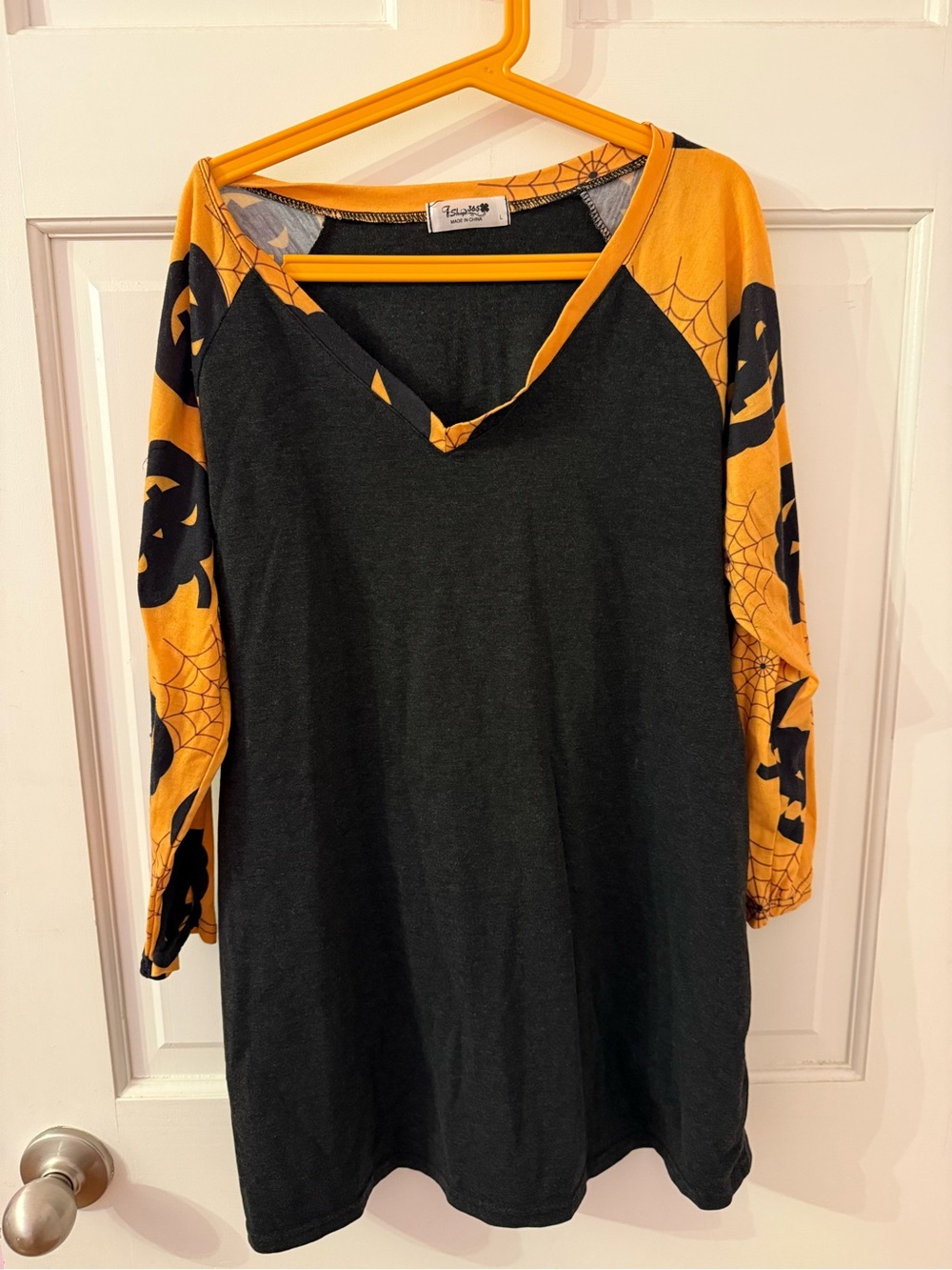 Avenue Black V-Neck Raglan Top with Orange Halloween Print Sleeves